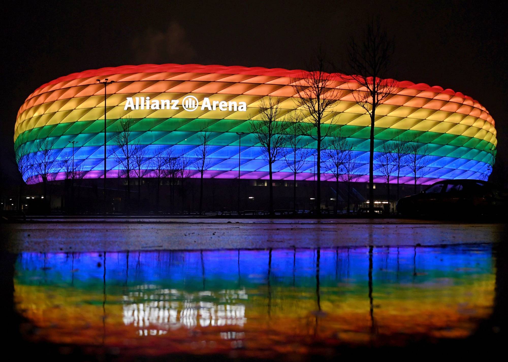 FILE PHOTO: Soccer Football - Bundesliga - Bayern Munich v TSG 1899 Hoffenheim - Allianz Arena, Munich, Germany - January 30, 2021 General view outside the stadium in rainbow colours after the match Pool via REUTERS/Andreas Gebert DFL regulations prohibit any use of photographs as image sequences and/or quasi-video./File Photo - RC2INN9J5BKN